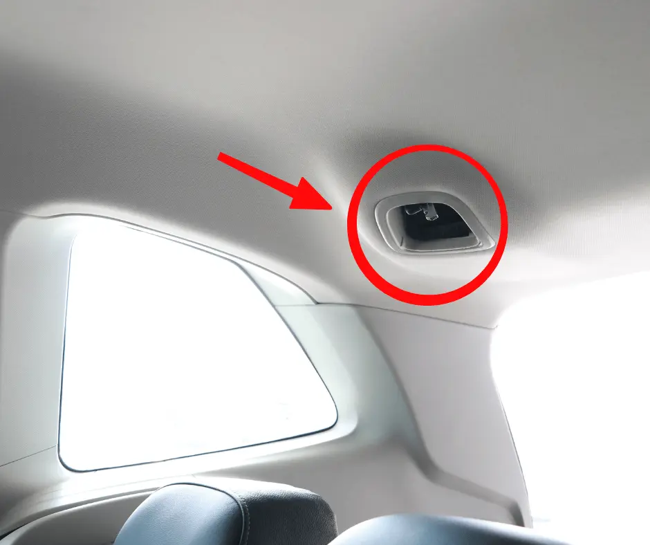 A tether anchor is usually behind the vehicle seat, to which the tether strap is attached.