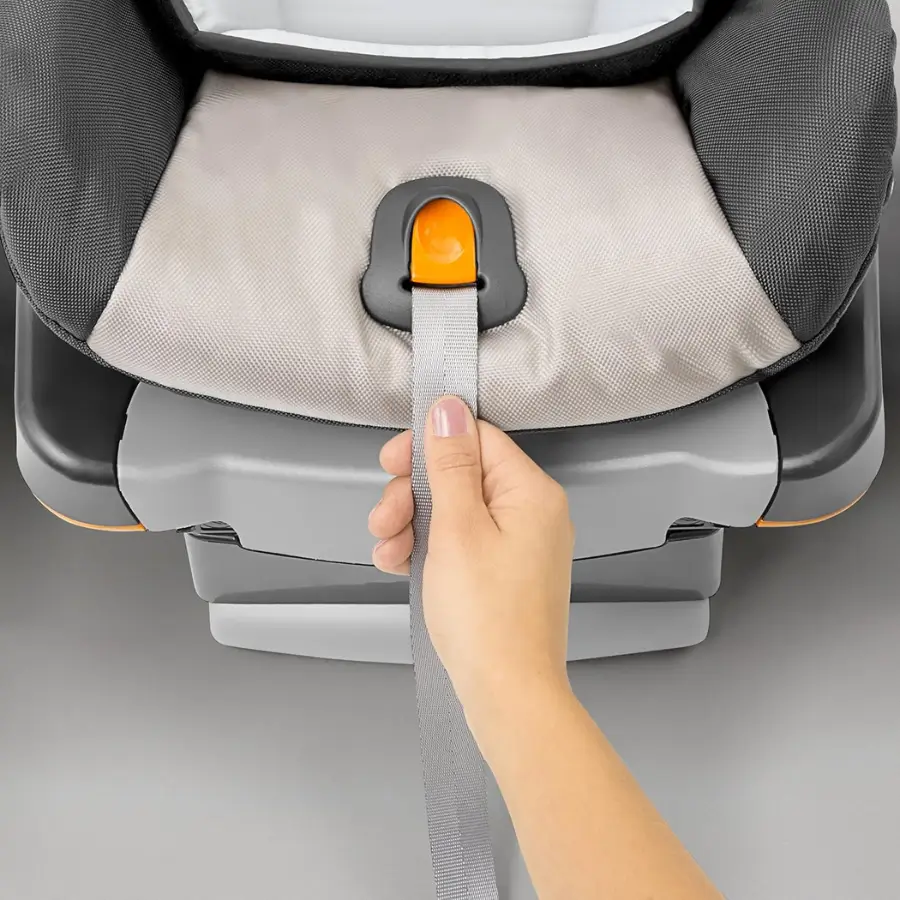 Chicco KeyFit 30 infant car seat with the one-pull harness tightener for secure fitting.