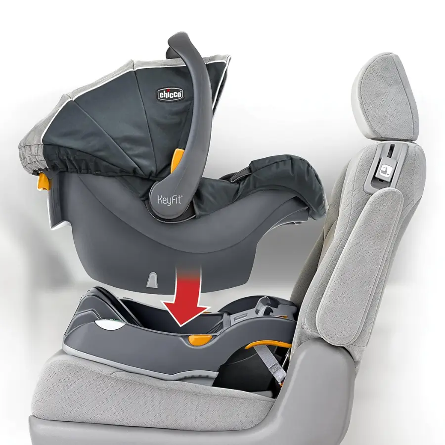 Chicco KeyFit 30 infant seat installing into car base. Easy fit and portable.